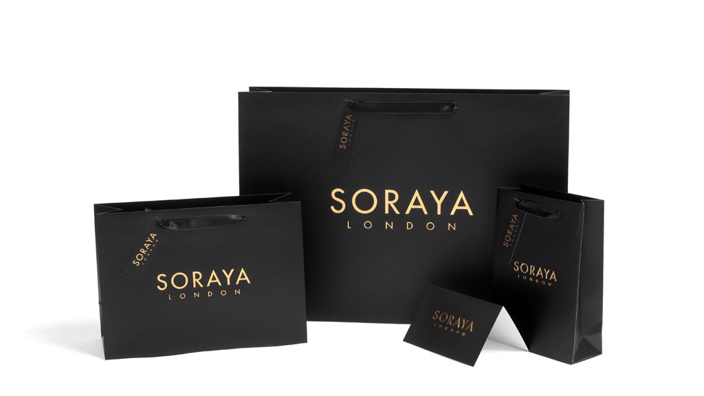 nPackLuxury's tweet photo. Black with gold hot foiled embossed logo is always an excellent combination to create a luxurious look on your paper packaging. Especially if your boutique's brand makes you feel stylish and unique. Handles from silk ribbon with branded hangtags will differentiate you furthermore https://t.co/YJaS9V9vZu