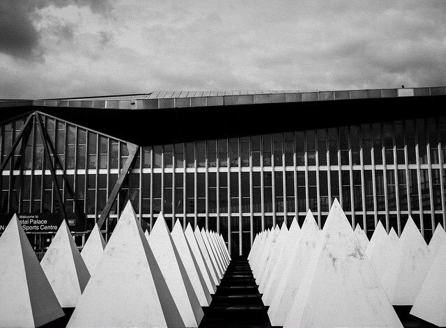 OurHutUK's tweet photo. We love the pyramids at Crystal Palace National Sports Centre. Opened in 1964, it was designed by the LCC Architects Department under Sir Leslie Martin and is a Grade II listed building. Read about our #SublimeStructures architectural education project https://t.co/27p4VOTt2E https://t.co/wfMrXPtbKQ