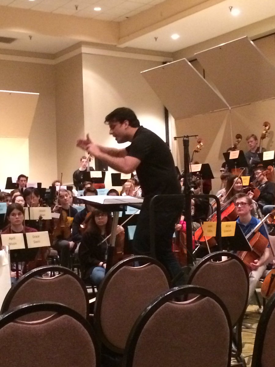TeachRowland's tweet photo. Meet the all state orchestra conductor and composer @SLMSOrch #MMEA2018 https://t.co/7j7Yyma2dR