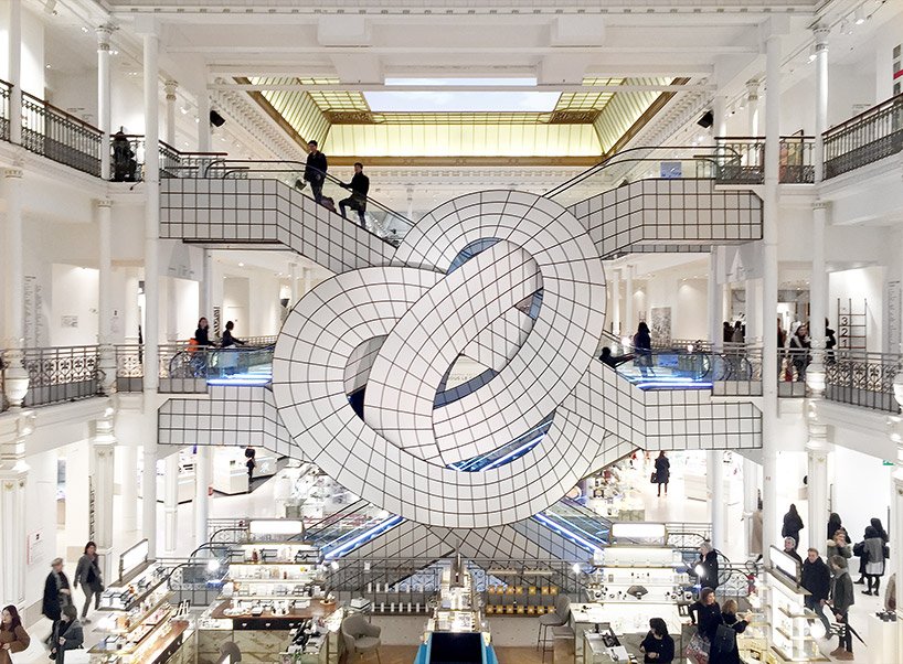 TotalityUK's tweet photo. Leandro Erlich twists Le Bon Marché's famed escalator into pretzel-like form.https://t.co/PSH3BaUCGl #retail #design #Paris https://t.co/Rq3DGKLEbr