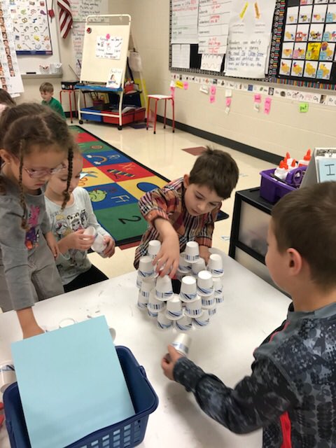 Kindergarteners are challenged to work independently and in small groups to complete winter themed STEM activities!