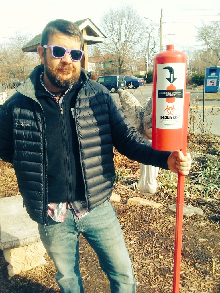 Eric from <a href="/AVLGreenWorks/">Asheville GreenWorks</a> brought their newly created syringe disposal unit to @HaywoodStreet for installation. Made from recycled fire extinguishers, these outdoor containers are inventive and indestructible! #harmreduction #avlnews