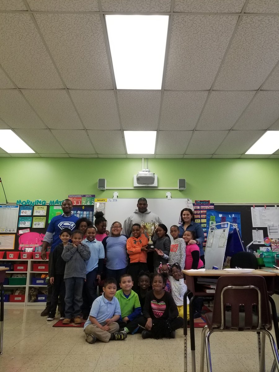 Celebrating our students' perfect attendance for the month with our attendance officer/mentor/teacher Mr. Ward.  #comprehensive teaching