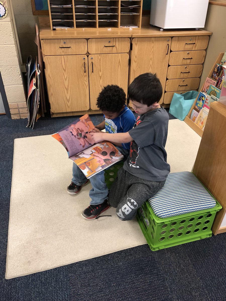 diana_harmony's tweet photo. Partner reading can be done anywhere...even under your teacher’s coat! #uvlearn https://t.co/4XmR0pvxLu