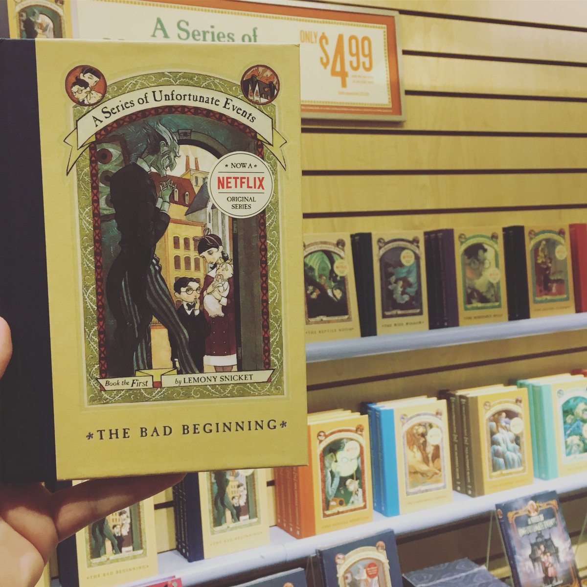 BNMorrisonPl's tweet photo. We regret to inform you that the first book of #LemonySnicket’s Abominable Adventure about the Baudelaire orphans—The #BadBeginning—is only 4.99 with the purchase of any children’s book. 😉 #aseriesofunfortunateevents #netflix #bnbuzz https://t.co/4oFaaqEmlt