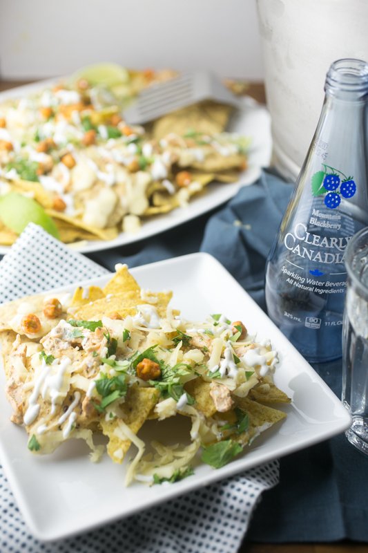 Don't forget to add these Sriracha-ranch chicken nachos to your game day menu! (And yes, that is Clearly Canadian - you can get it at <a href="/worldmarket/">World Market</a>!) #sponsored #worldmarkettribe chattavore.com/sriracha-ranch…