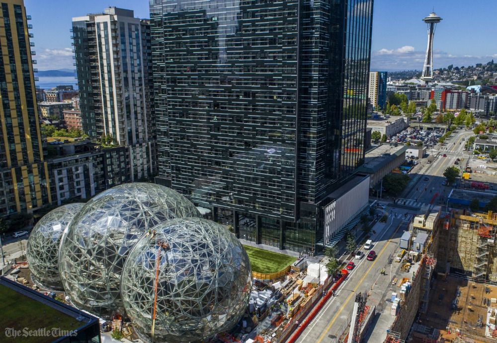 seattletimes's tweet photo. Will Amazon’s Spheres replace the Space Needle as the new symbol of Seattle? 
Vote in the poll by economics columnist @jontalton: https://t.co/EVBrTfP9MZ https://t.co/Wb8gVP1Mjh