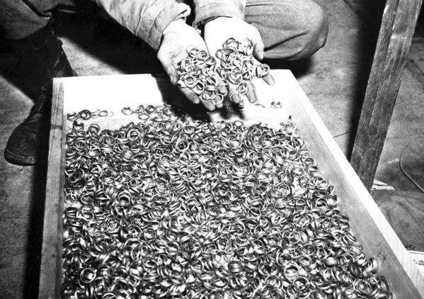 marcuschown's tweet image. Where hate leads @History_Pics: Wedding rings of Holocaust victims, near the Buchenwald concentration camp, 1945 #HolocaustMemorialDay