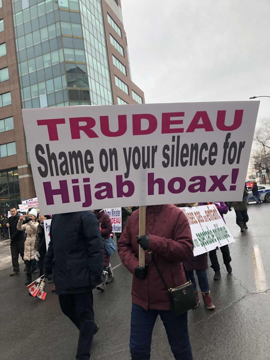 Luckystarangle's tweet photo. Canadians marching in Montreal protesting against @JustinTrudeau etc.’s hasty remarks condemning hate crime of a girl’s Hijab being cut before the @TOpolice1 even started investigation.. . @JustinTrudeau @Kathleen_Wynne @CBCNews need to apologize to all Canadians! https://t.co/LnRiFS2xIK