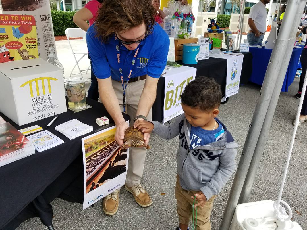imaxftl's tweet photo. The MODS Squad is at Tri Rail Fun Day. Visit our booth and meet our Box Turtle Hype, receive free goodie bags, plus enter to win free tickets to see new exhibits Curious George and Clifford The Big Red Dig! #trirail #trirailfunday #modssquad #museum #museumofdiscoveryandscience https://t.co/njCUve62ME