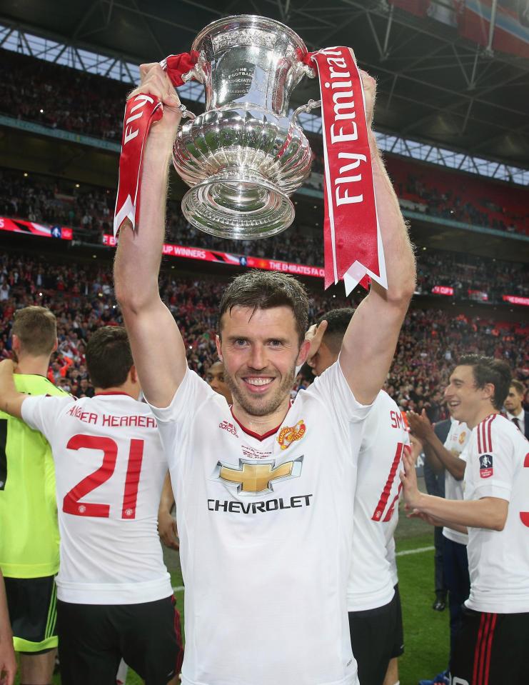 However, Michael Carrick somehow loses the lid while holding the trophy. And news of Van Gaal's sacking reaches him before he can even finish the celebrations.