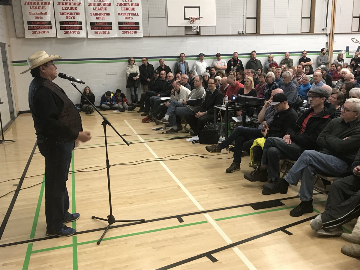 Chief Lee Crowchild speaks to a full gym of Lakeview residents  <a href="/CBCCalgary/">CBC Calgary</a>