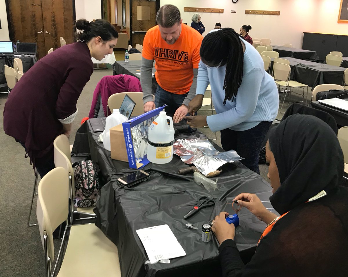 josuefalaise's tweet photo. Look at some of the teams in their designing phase of the @TMCCCHack competition. There was a lot of collaborating and thinking going on. #TMCCCHack https://t.co/ZgfCoCEfSX