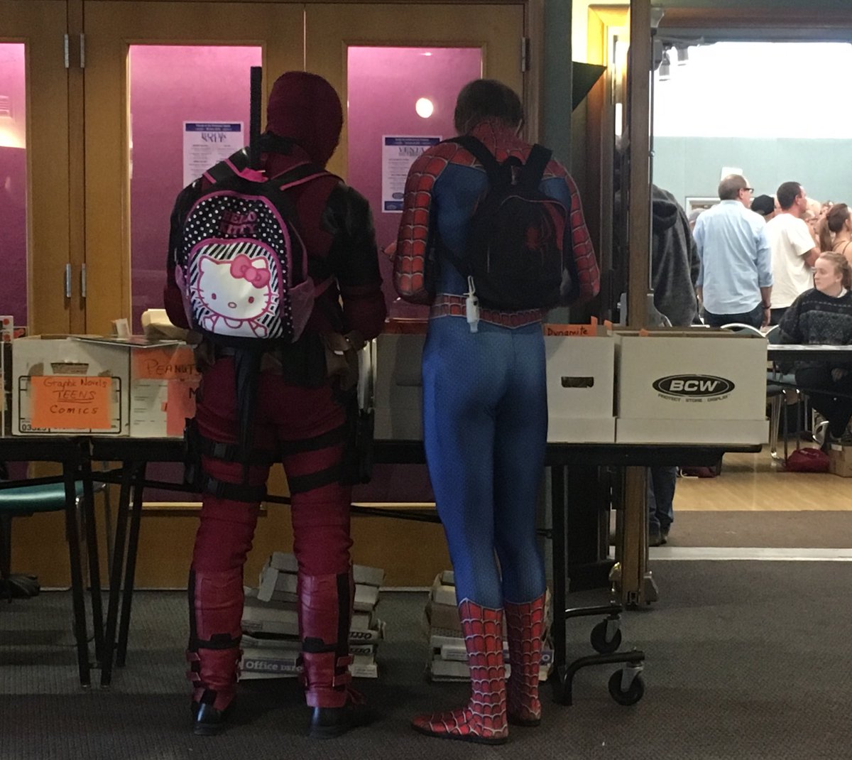 cheerful_earl's tweet photo. Deadpool and Spidey browsing comics at the con. #LumaCon https://t.co/FWCxFiAqcK