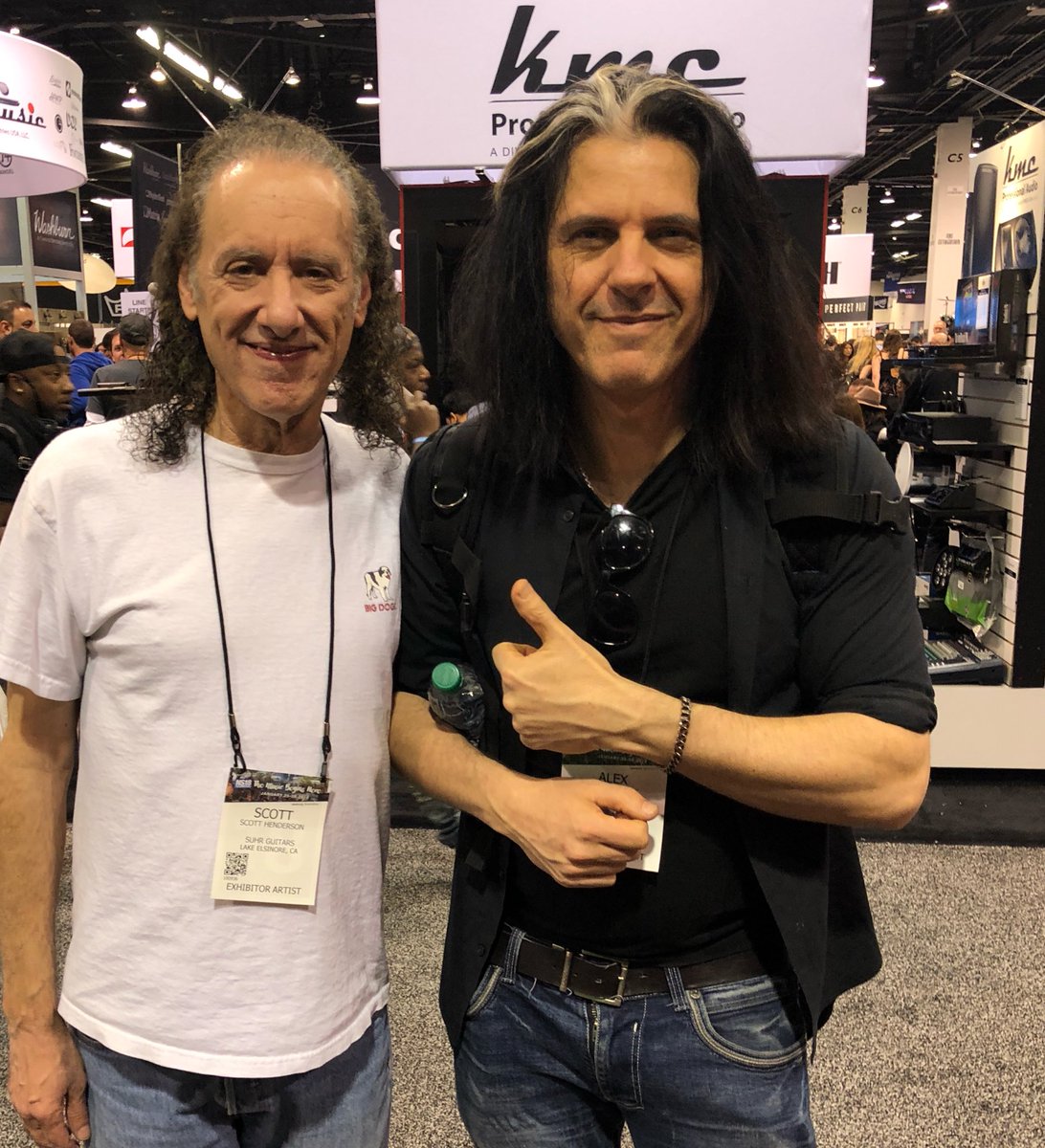 AlexSkolnick's tweet photo. First NAMM selfie of the day. He came up and said hi to ME! Whoa!! Floating on air now... Total hero, one of the best ever imho. Who knows who this is?  #NAMM #NAMM2018 https://t.co/IUkNBGCn93