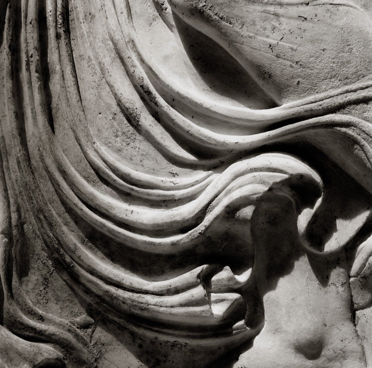 Exquisite relief of a Dancing Maenad wearing an ivy wreath &amp; carrying a thyrsos-her swirling see-through dress moves forward w/ her trance-like dance-notice skin creases on her neck &amp; inconspicuous navel-Roman pentelic marble copy after Greek original 425-400 BC by Kallimachos
