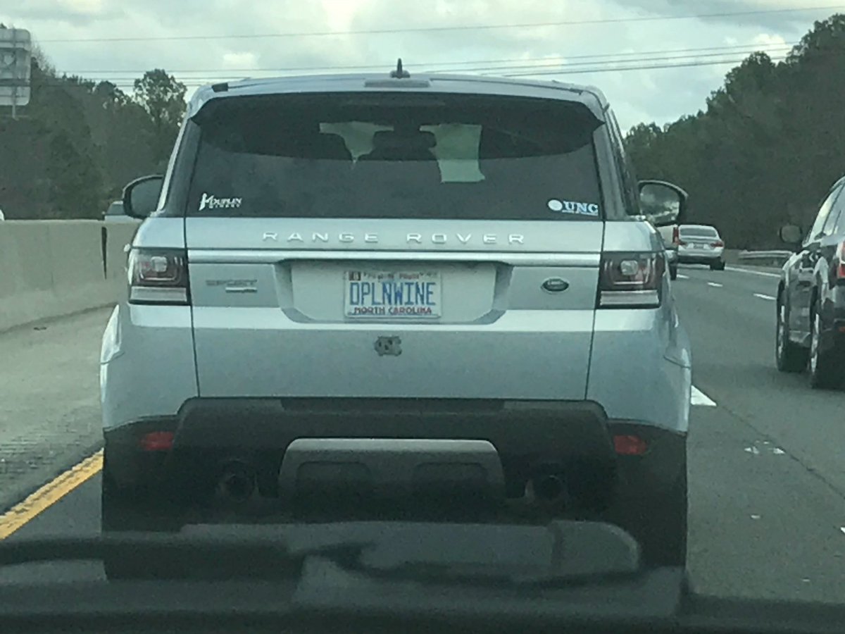 DPart86's tweet image. @duplinwinery Passed this car on I-40 in Chapel Hill after the game. I noticed the Duplin winery license plate, pulled around them and gave the Wolf hands! Back seat guy rolled his window down and gave us the middle finger HAHAHA! Great day to be a Pack fan! #GTHC #GoPack #WPN
