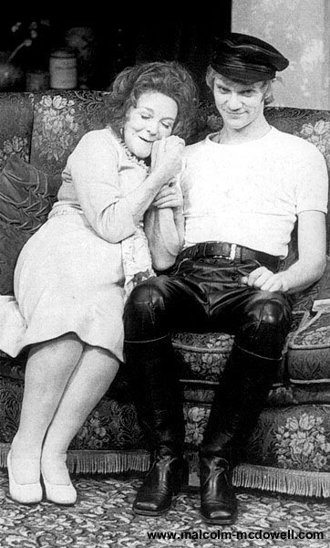 The wonderful <a href="/McDowellMalc/">Malcolm McDowell</a> makes a great Sloane alongside the inimitable Beryl Reid in 1975.