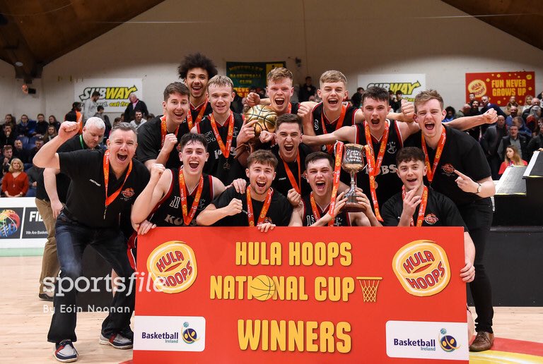 sportsfile's tweet photo. KUBS are the @HulaHoopsIE Under 20 Men’s National Cup winners! They celebrate with the cup after defeating Moycullen in the final https://t.co/giSGlt1Ay3
