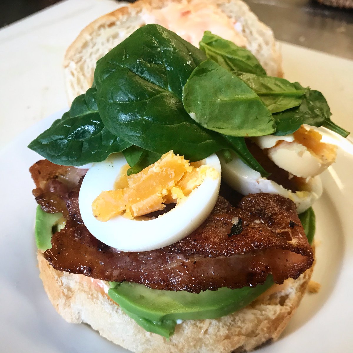 Norfolk_Deli's tweet photo. Having been sent some #Crolls we’ve been asked to come up with some suitable fillings. Today we’ve created a sweet chilli mayo, avocado, crispy smoked streaky bacon, free range hard boiled eggs and spinach combo. In the taste test it got the thumbs up 👍 https://t.co/tndkg2xE4R