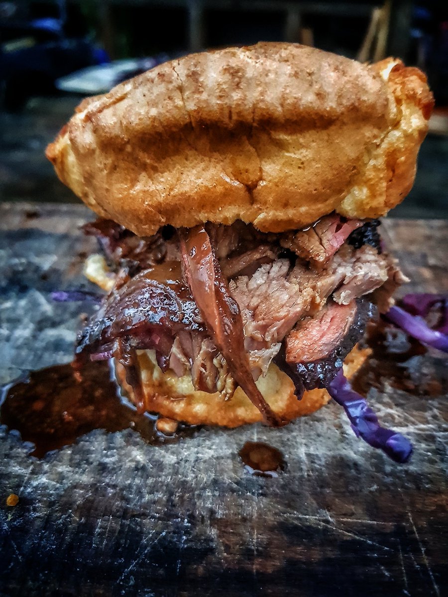 devonwoodsmoke's tweet photo. This was filthy and wonderful......smoked mocha brisket...ale and onion gravy...braised red cabbage...loaded up into a Yorkshire pudding #ukbbq #bbq https://t.co/qf4X637nCF