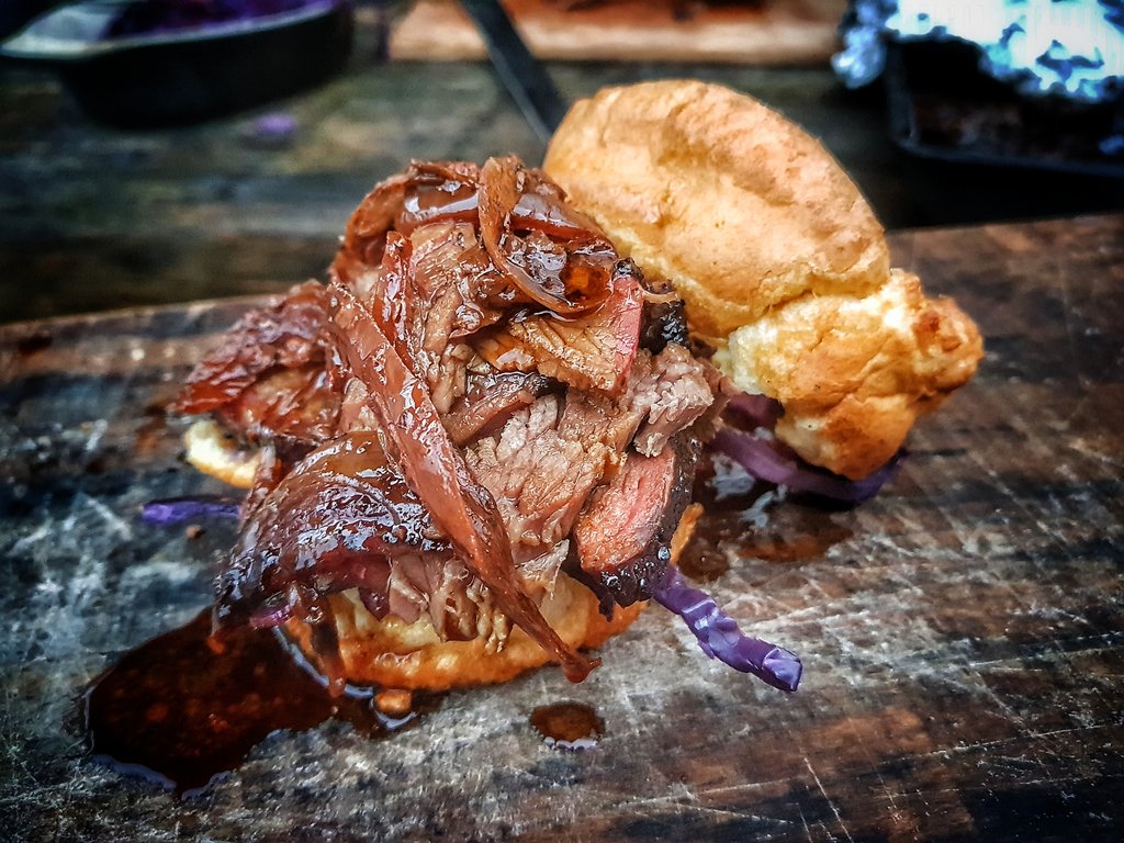devonwoodsmoke's tweet photo. This was filthy and wonderful......smoked mocha brisket...ale and onion gravy...braised red cabbage...loaded up into a Yorkshire pudding #ukbbq #bbq https://t.co/qf4X637nCF