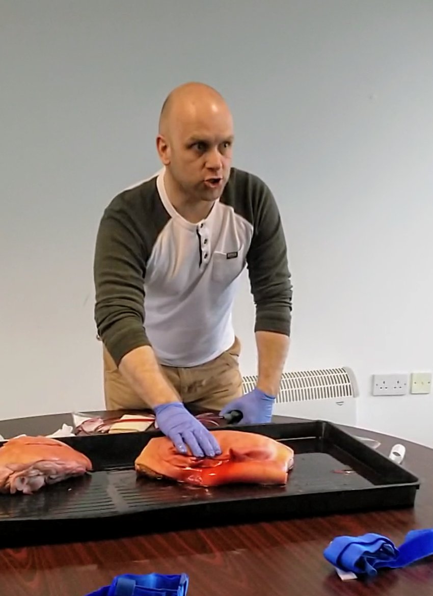 DeaksND's tweet photo. Final #skillsstation at #MSRSTW; #haemorrhagecontrol. It looks intense, because it was! Excellent improv with blackcurrant juice. Remember C-ABC if your patient is bleeding out. #tourniquet and #IOaccess practise too #motorsportrescue https://t.co/aa0MWZw1aX