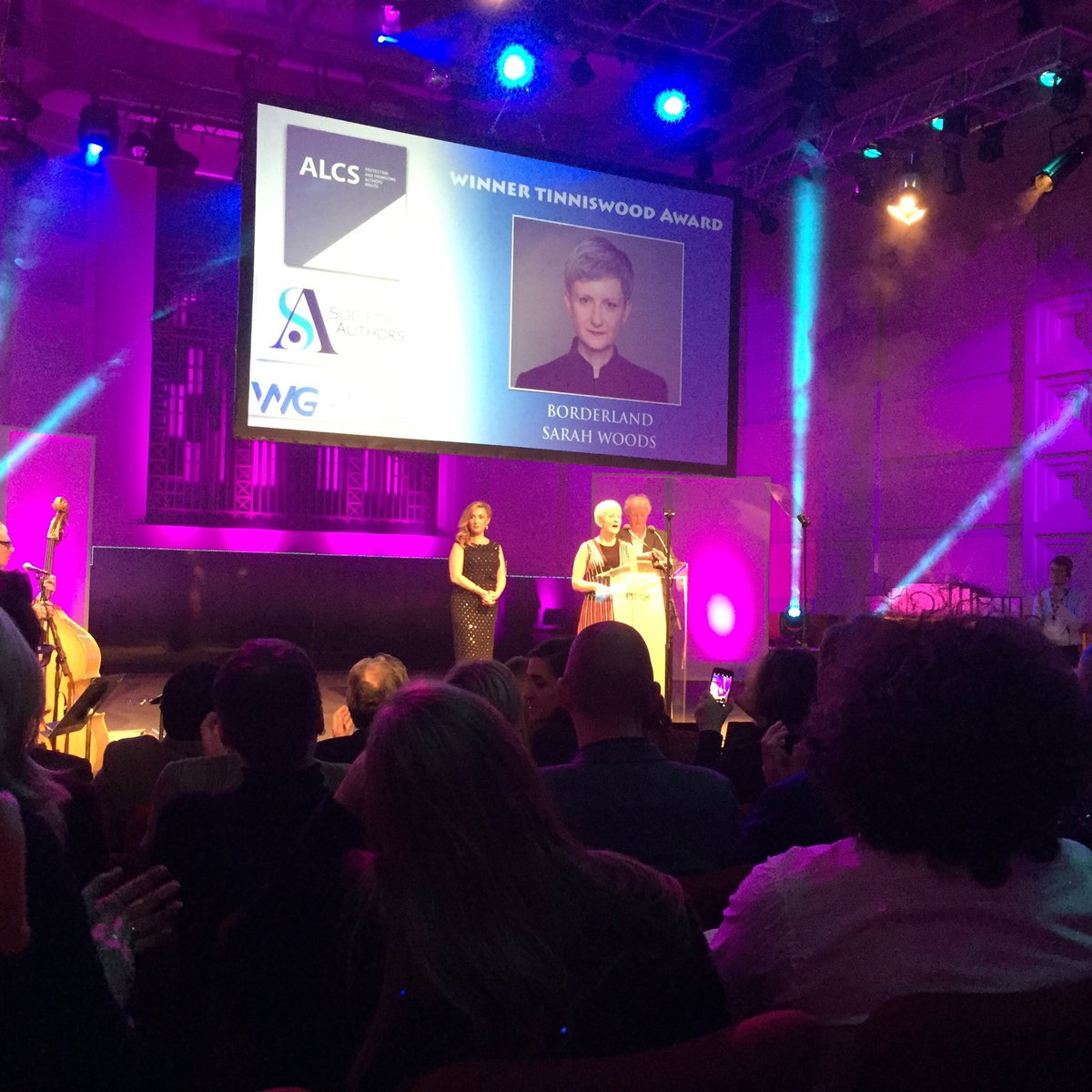 The Writers' Guild (@thewritersguild) on Twitter photo Sarah Woods wins #TinniswoodAward 2018 for Borderland, with commendation awarded to <a href="/JohnFinnemore/">John Finnemore</a> for Double Acts: Penguin Diplomacy #BBCAudioDramaAwards Sarah Woods wins #TinniswoodAward 2018 for Borderland, with commendation awarded to <a href="/JohnFinnemore/">John Finnemore</a> for Double Acts: Penguin Diplomacy #BBCAudioDramaAwards