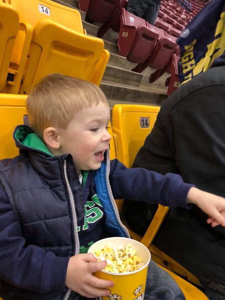 haycrawford's tweet photo. Please look at my baby cousin having the time of his life at his first hockey game and then passing out https://t.co/1iUHvJ5Mrm