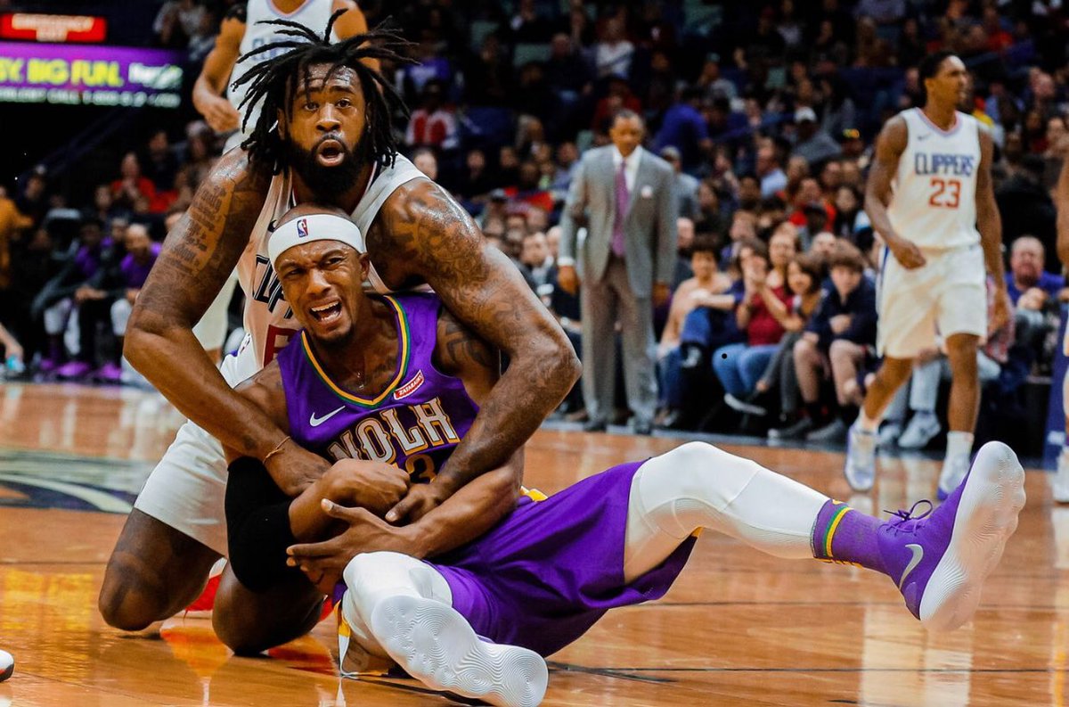 justin_halpern's tweet photo. This photo looks like Deandre Jordan is comforting Dante Cunningham mere moments after Dante watched a car explode with his family in it https://t.co/YSSCKFL5IW