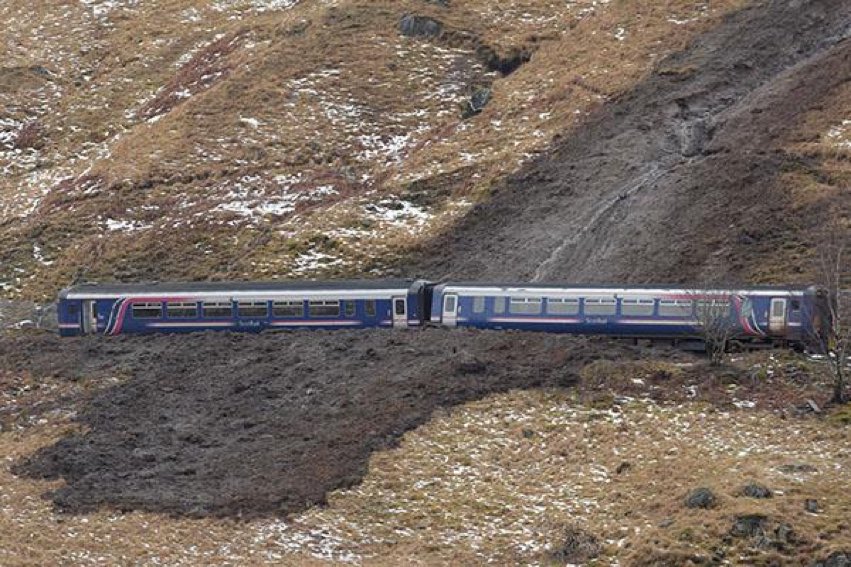 BenGoldsmith's tweet photo. This is the price of our misplaced romantic attachment to hills stuffed with sheep and deer: the British uplands are an overgrazed, lifeless desert that contribute to a cycle of flooding and drought in the lowlands beneath, and are prone to erosion and landslides like this one. https://t.co/yjZjelxRRG