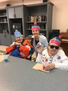 GreystoneHCM's tweet photo. Riverwood Health and Rehabilitation Center held a No Snow Day social last week where residents enjoyed delicious #snow cones and sported snow hats while plotting faux snowball fights! https://t.co/O3L2TwkEbr