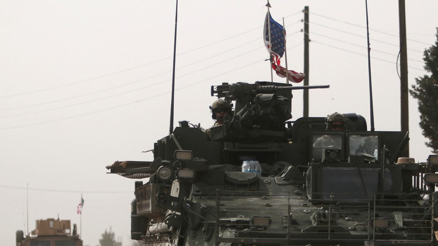 RT_com's tweet photo. Syria showdown: #Turkey takes aim at #Manbij, but Washington says US forces aren’t leaving https://t.co/4HOjg1iVmA https://t.co/yQLFXoudFd