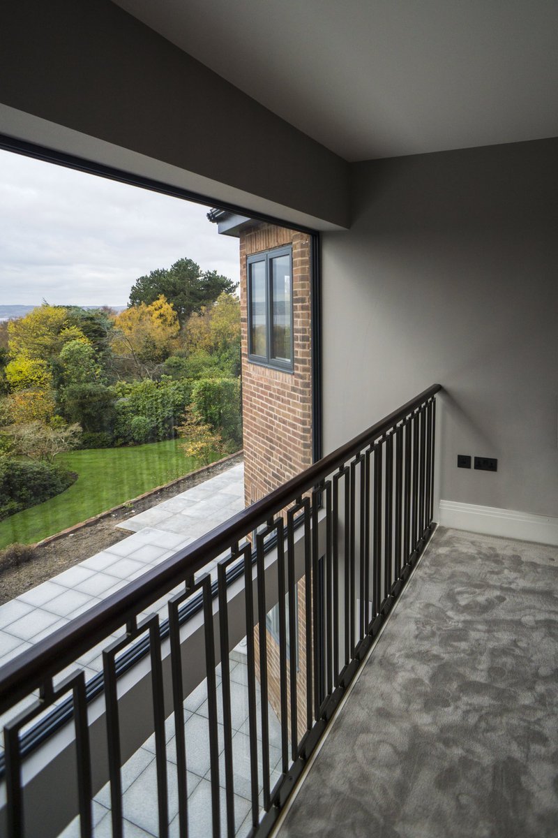 Bespoke balustrade and timber handrails.