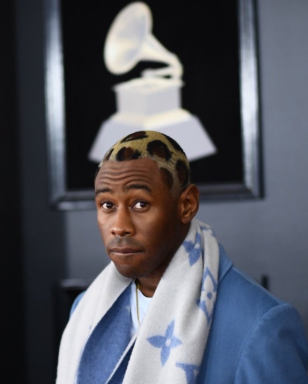 The Fashion Court on X: Tyler the Creator topped off his baby blue look  with a #LouisVuitton scarf and leopard print hair at the 2018 Grammy  Awards. #Grammys.  #Grammys2018   /