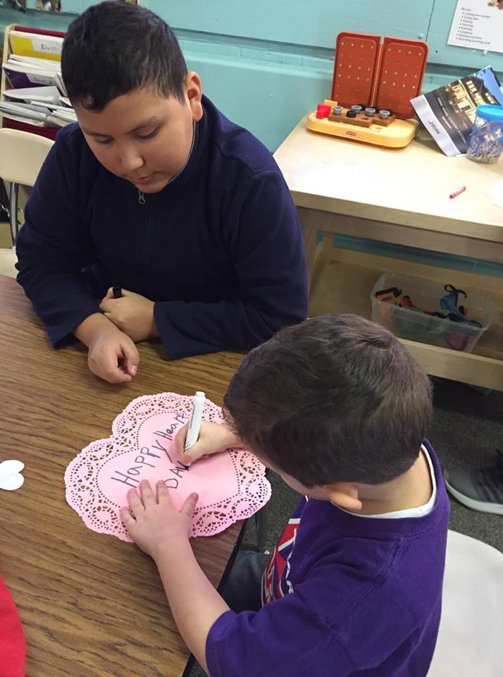 jpettykc's tweet image. The &quot;big kids&quot; came to spend time with the preschoolers during Catholic Schools Week. While there they helped us work on our literacy skills! #scpsi