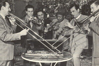 Trumpeter Roy Eldridge was born today in 1911. "Droves of people would ask him for his autograph at the end of the night, but later, on the bus, he wouldn't be able to get off and buy a hamburger with the guys in the band (segregation)." ~ Artie Shaw #Jazz youtu.be/8rvdul0LZsI