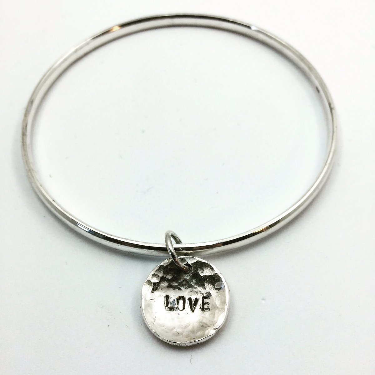 AWDesignsLove's tweet photo. Gorgeous solid silver bangle and LOVE charm...Valentine's sorted...you can even customise it your own word ❤️ https://t.co/CCa02ZrFtJ