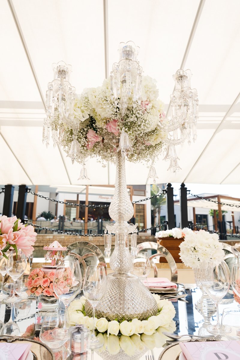 EventchicD's tweet photo. Crystal candle holders decorated with flowers running in the shades of white and pink amplified the Dior theme party https://t.co/vyvoid7rCf
