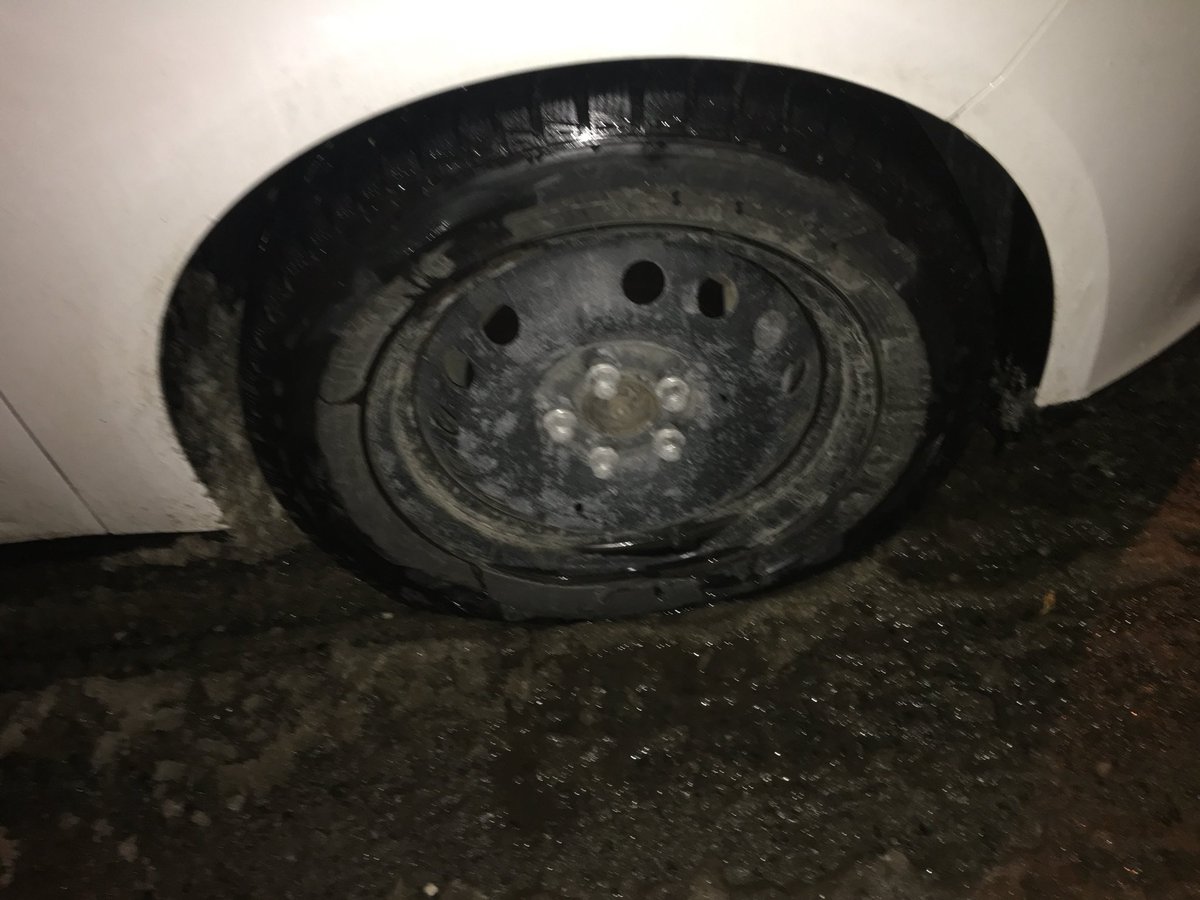 While driving to work this morning I hit this pot hole.   This was on Queen street under the Dufferin bridge Destroyed my tire #311