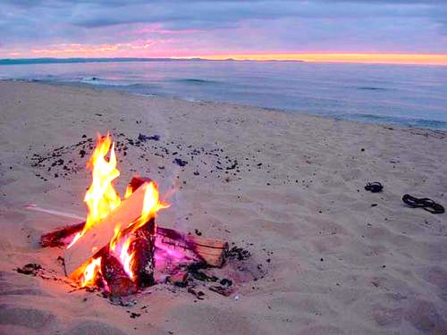 Drinking #BeachWhiskey Hot Toddy’s as warm as this fire. #BeachIt