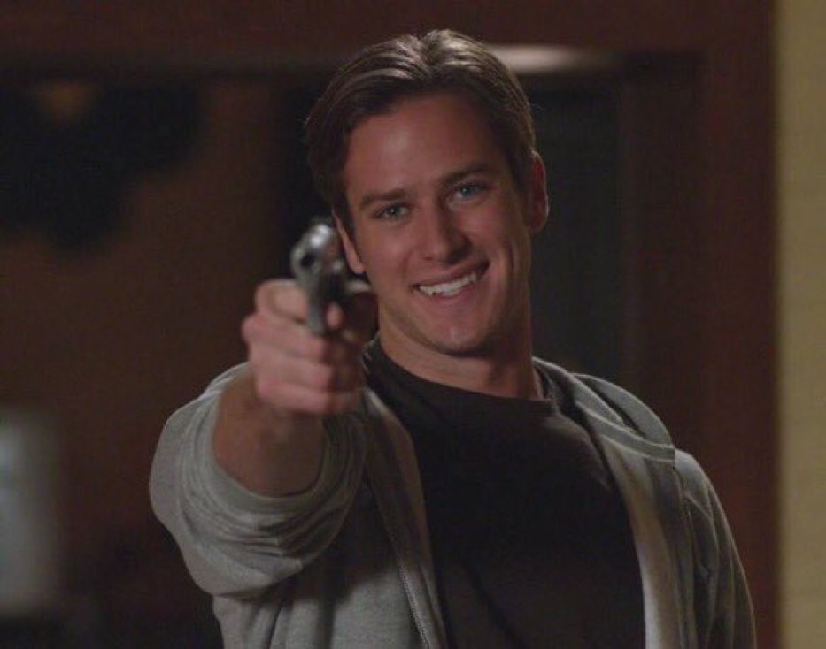 ArmieThings's tweet photo. Armie pointing a gun and smiling 🔫🙂 https://t.co/TGKi6a7vY5