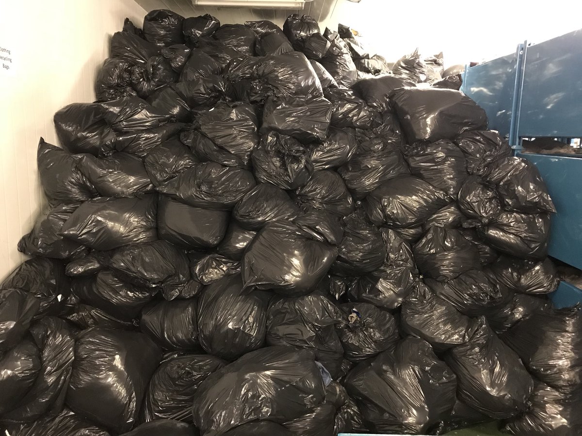 AlbertaApparel's tweet photo. This is a picture of bags full of clothing folks. It was taken from the drop in centre. This is why we need to buy less clothing, and make what we have last longer. This clothing might not get used again or upcycled. https://t.co/KLQMAw2fZ5