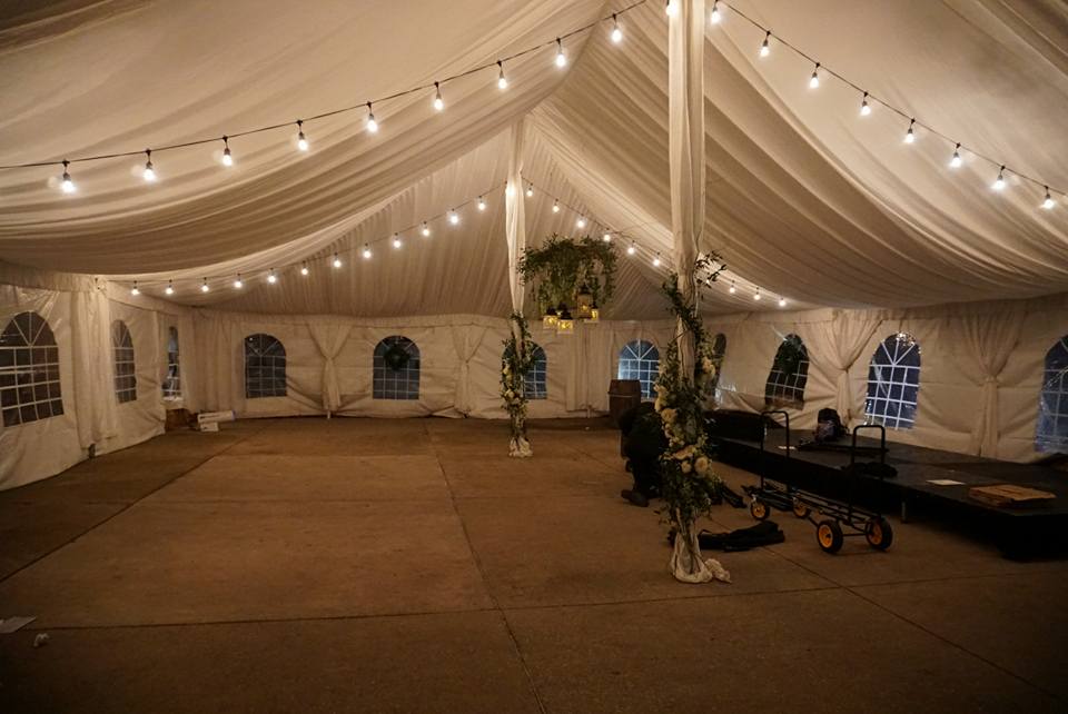 PPPalaceRentals's tweet photo. Harvest Tables, Chairs, Draping, Uplighting, Bulb Lighting, Tent &amp; Stage for Wedding Reception 11.18.2017 @ BCC with Fancy Florals by Nancy &amp; @MattStedmanBand!! #PalaceEvents #TEAM #HarvestTables #BloomingtonCountryClub #ChiavariChairs #Uplighting #BulbLighting #Tent #Draping https://t.co/TqDQHGCwOO