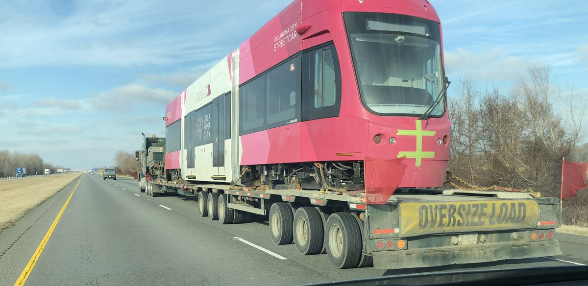 KentOgle's tweet photo. Our OKC street cars seen on the highway in Arkansas! On the way!! https://t.co/SMjUs2s6Fo