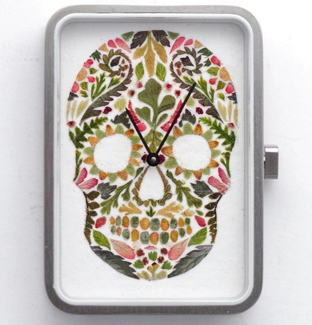 Throwback photo of this insanely detailed sugar skull by <a href="/helenahpornsiri/">Helen Ahpornsiri</a> 😱😱😱 Each leaf and pedal placed by hand!! #schmutzwatches #arrforyourwrist #fernart  ______________________________________________________________ #watch #fern #sugarskull #sku… ift.tt/2svfP9E