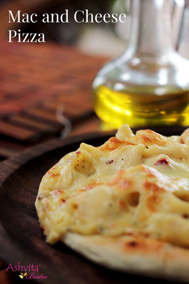Mac and cheese pizzaaaaa! Super loaded home-style pizza will make your day. Drop in for comfort at Ashvita Bistro anytime! #ashvitabistro #macncheese #pizza #pizzalove #classic #yummy #tummy #super #tasty