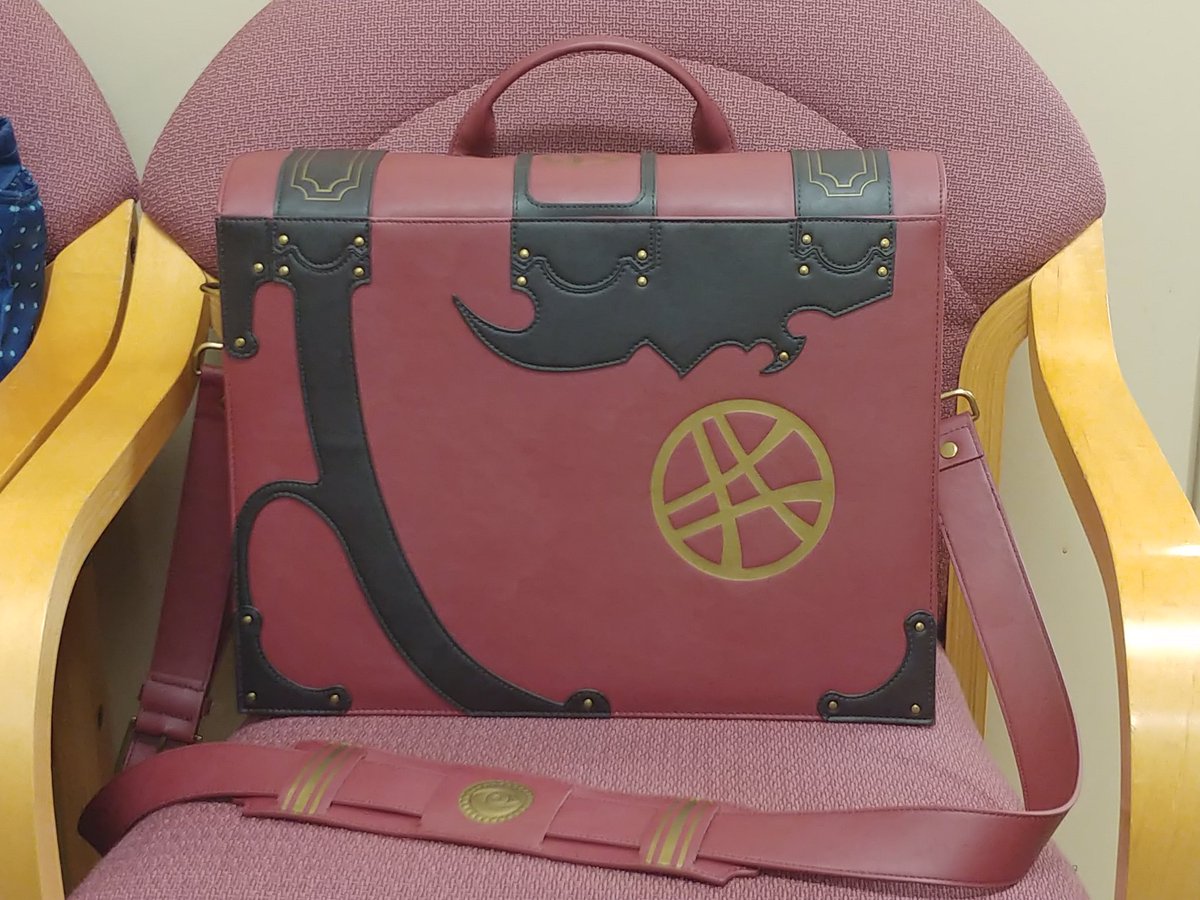 book of vishanti messenger bag