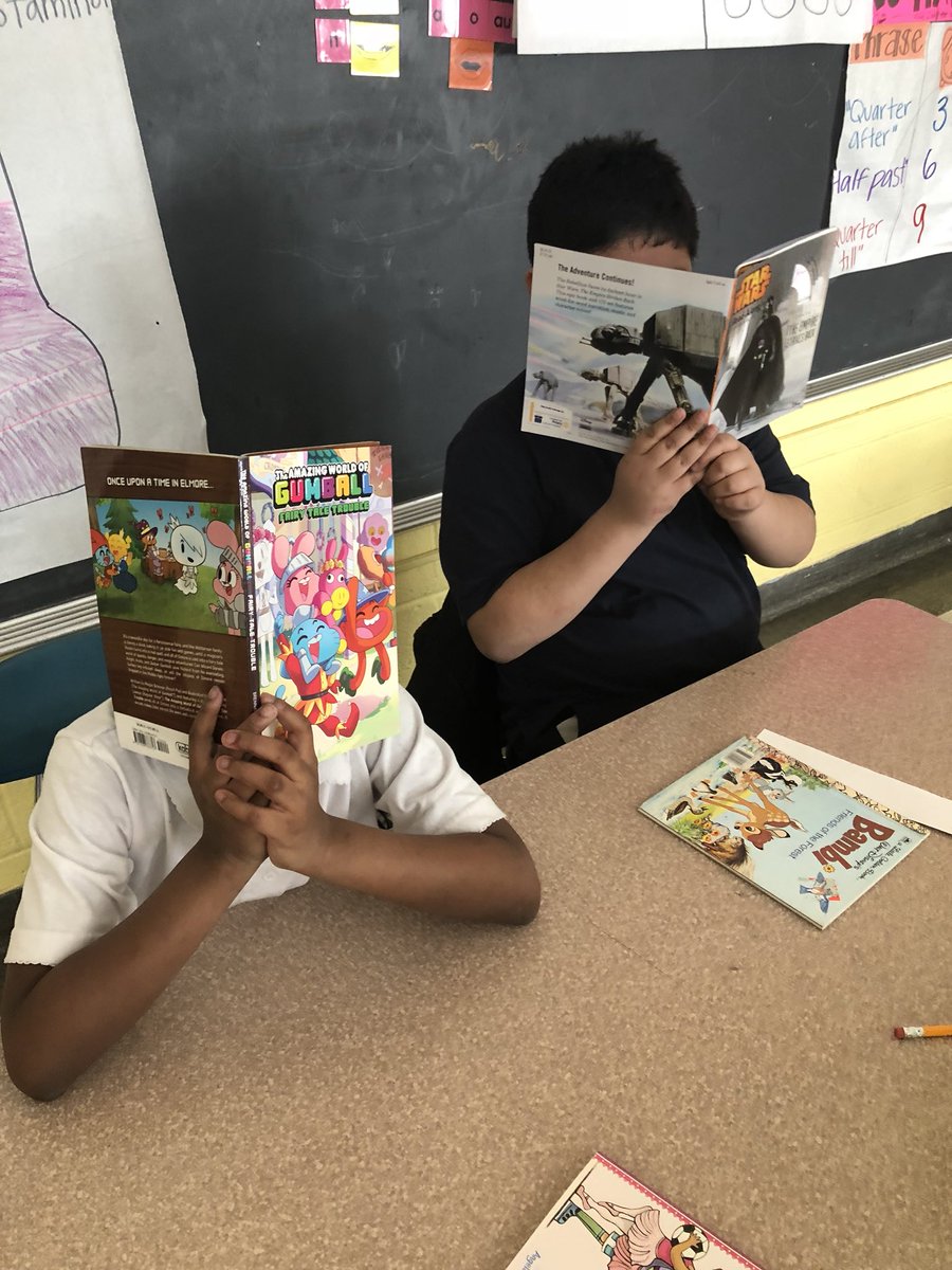 TeamRuklick's tweet photo. We can’t get our noses out of our books! Thank you @ChurchoftheRez for the #bookmobile and the treats for Miss Ruklick’s room to stay clean! https://t.co/yNIKh2eFBg
