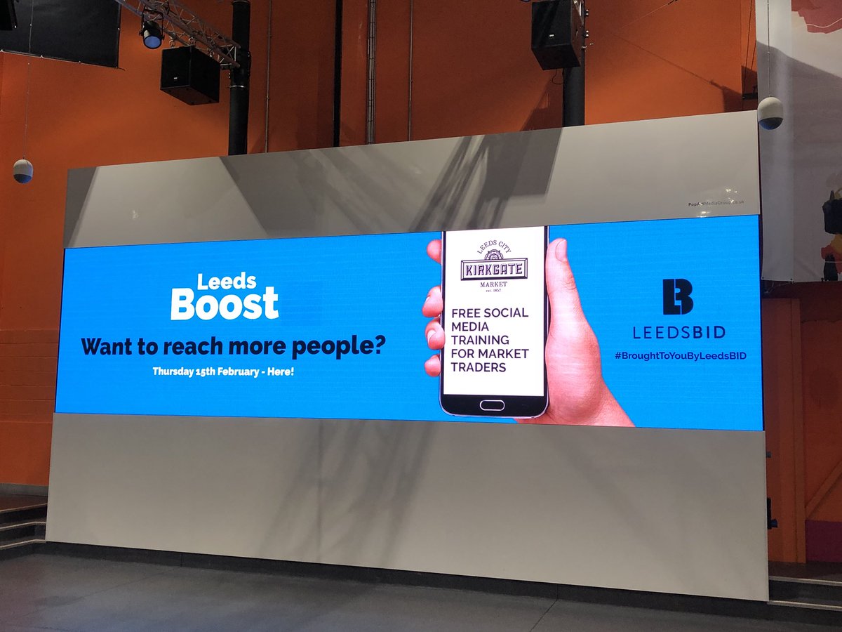 LeedsBoost's tweet photo. Sharing our message on the big screen @LeedsMarkets. Leeds Boost is brought to you by @LeedsBID. #digitalskills #leedsboost #leedsbid #socialmedia #turnedontodigital #leeds https://t.co/W87o54FR19
